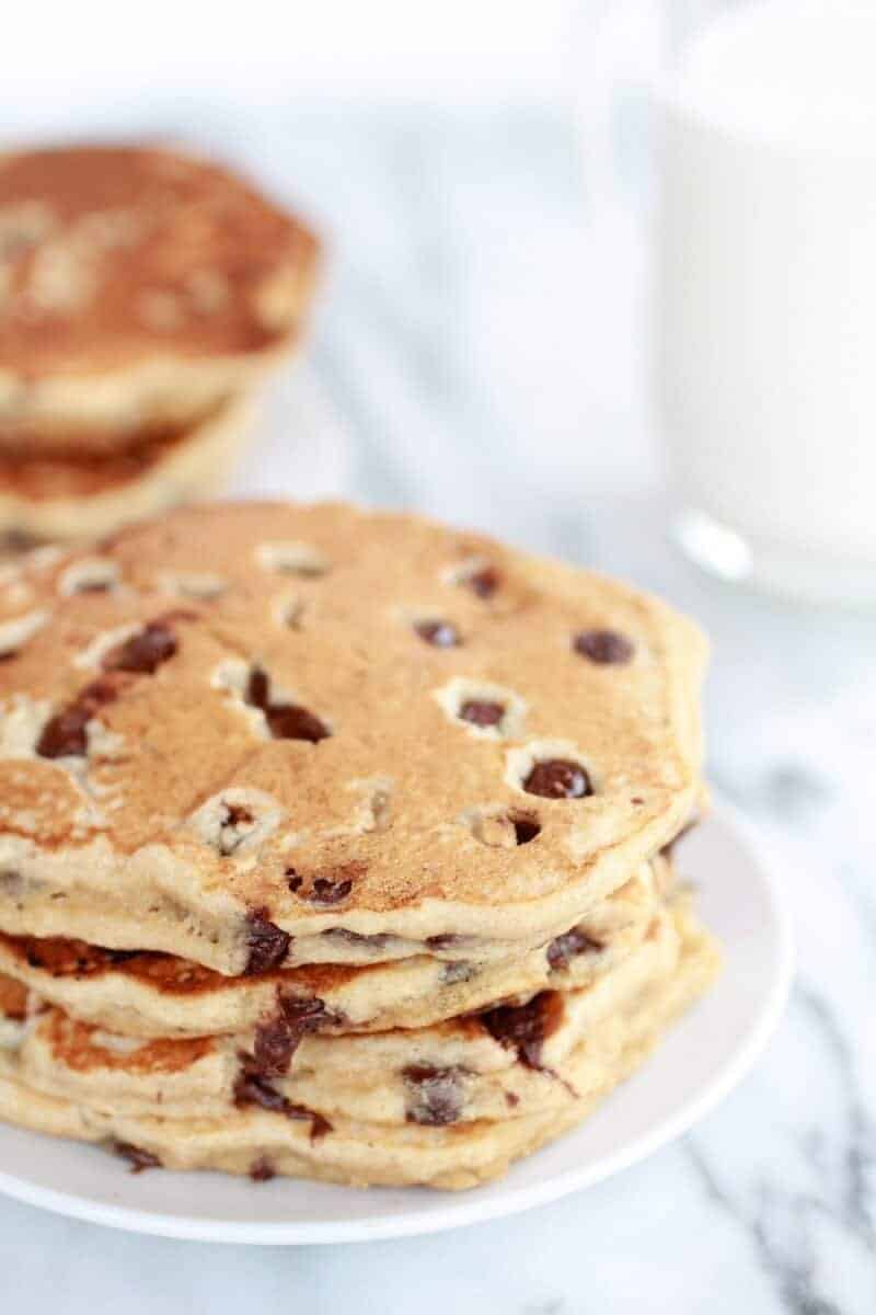 Whole Wheat Chocolate Chip Banana Bread Pancakes with a Vanilla Coconut Glaze
