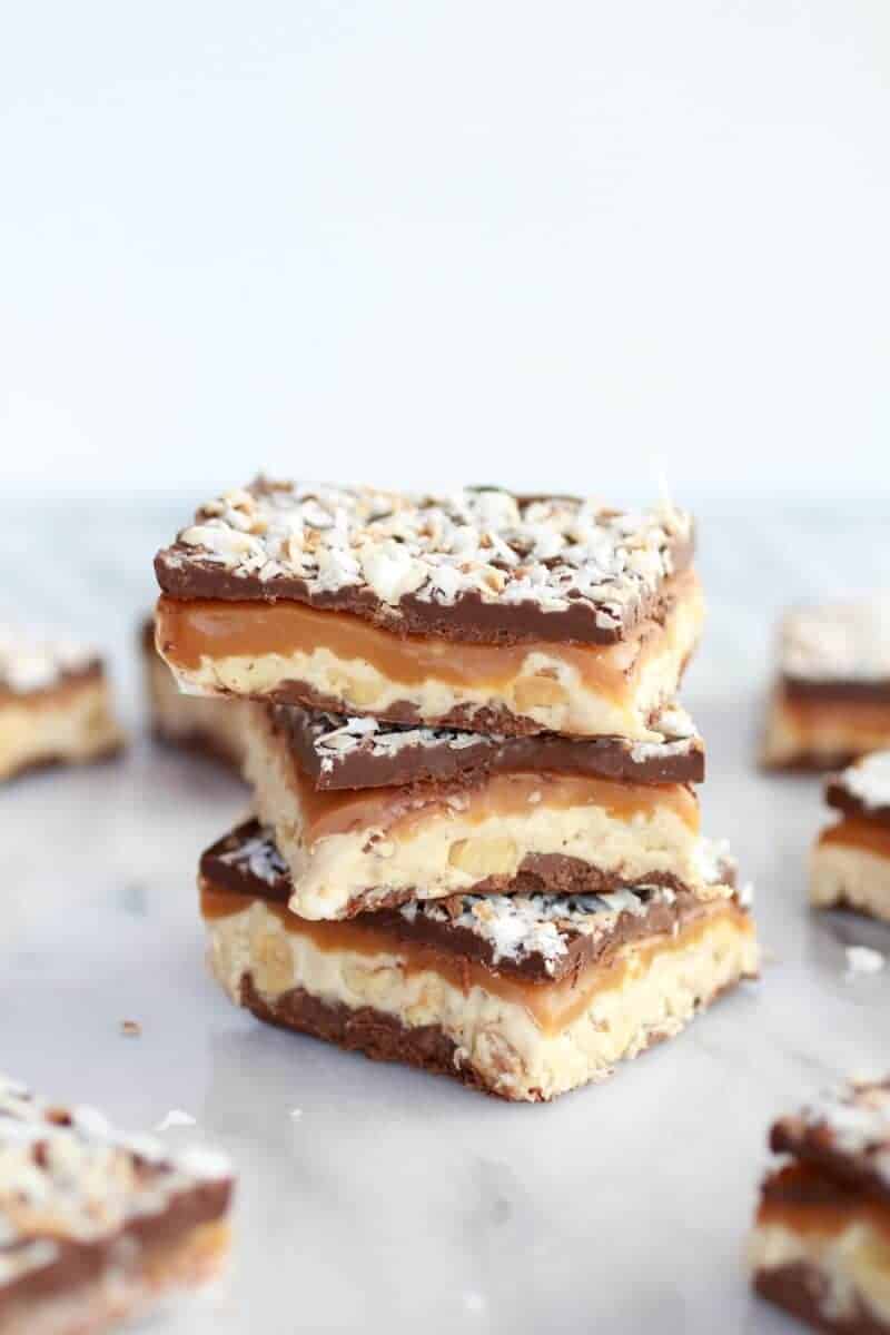 Toasted Coconut Caramel Peanut Butter Snickers Bars | halfbakedharvest.com