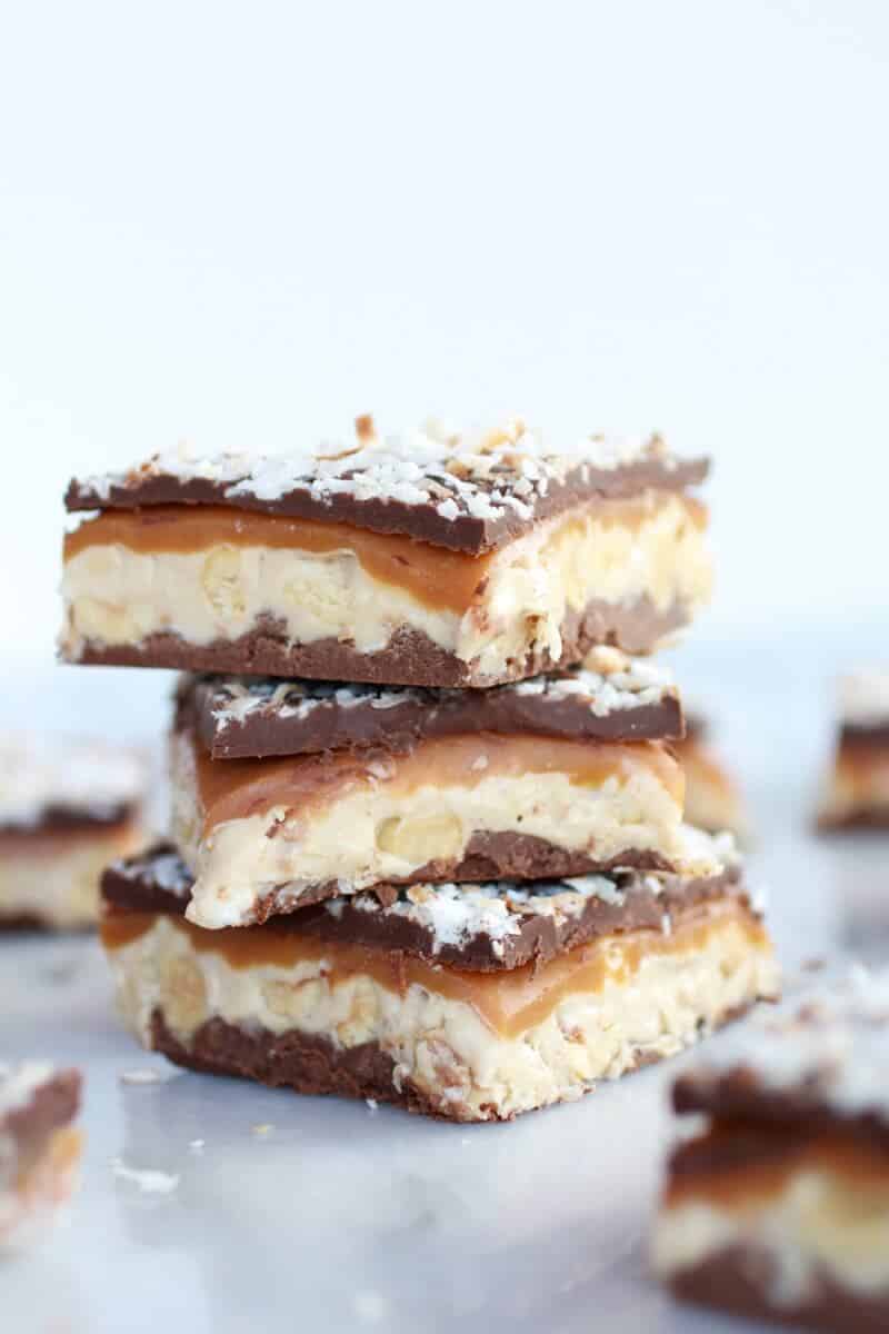 Toasted Coconut Caramel Peanut Butter Snickers Bars | halfbakedharvest.com