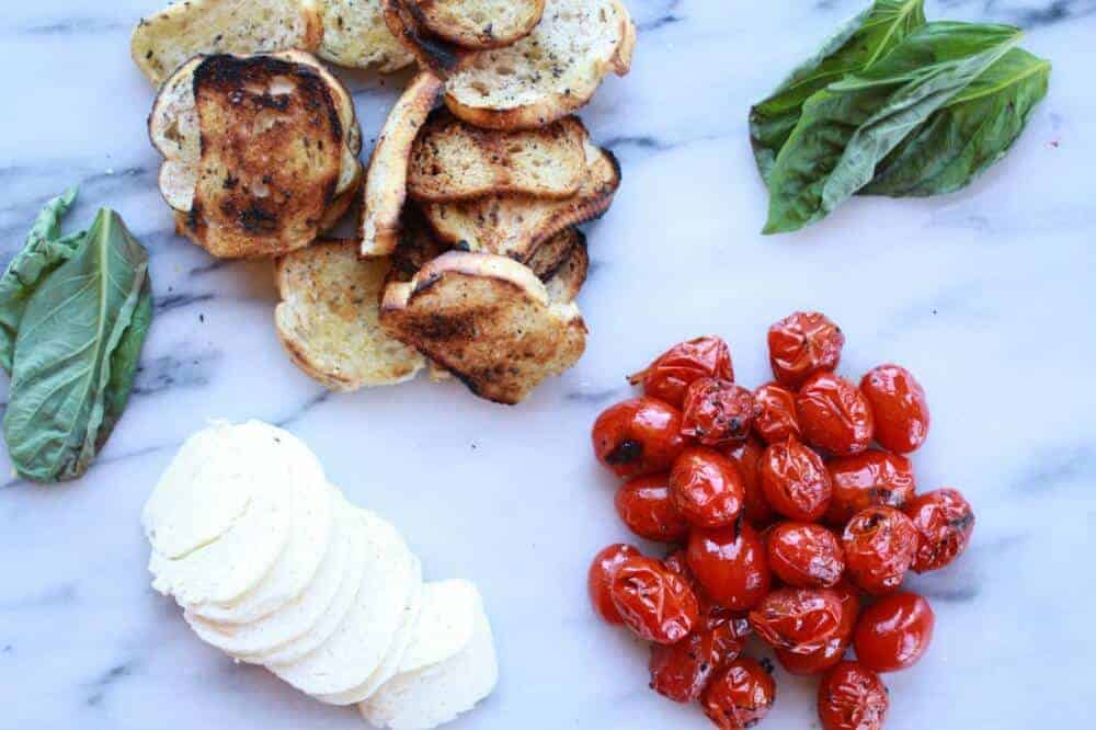 Blistered Tomato Grilled Toast Caprese Nachos with Balsamic Glaze || halfbakedharvest.com
