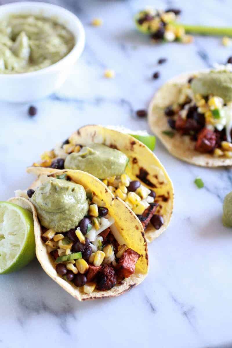 Sweet potato + Chorizo Tacos with Black Bean Salsa and Roasted Poblano Avocado Crema | halfbakedharvest.com