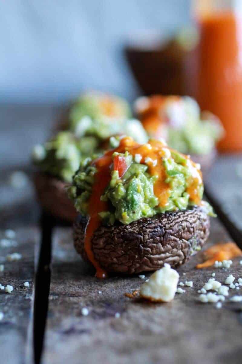 Blue Cheese Guacamole Stuffed Mushrooms with Buffalo Sauce | halfbakedharvest.com