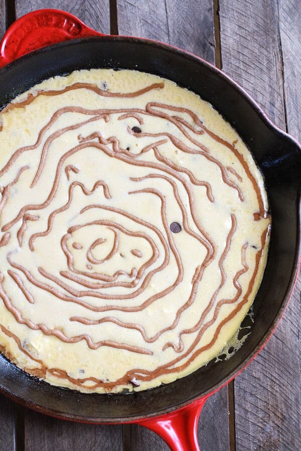 Chocolate Chip Pumpkin Cinnamon Roll Dutch Baby | halfbakedharvest.com