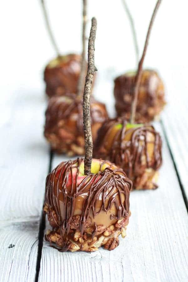 Sweet and Salty Bourbon Cinnamon Pecan Caramel Apples + Chocolate Drizzle | halfbakedharvest.com