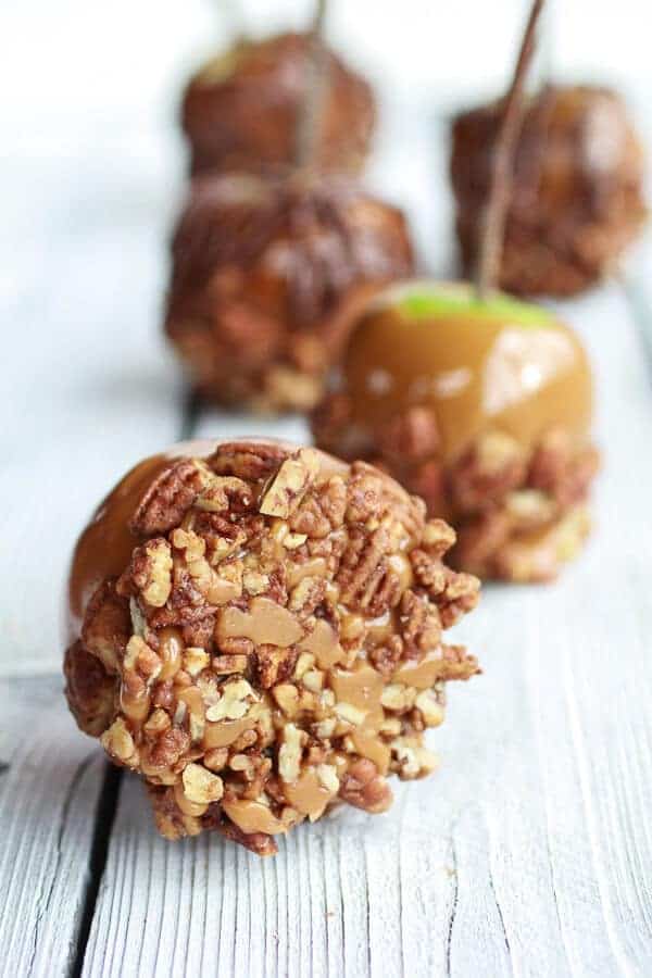 Sweet and Salty Bourbon Cinnamon Pecan Caramel Apples + Chocolate Drizzle | halfbakedharvest.com