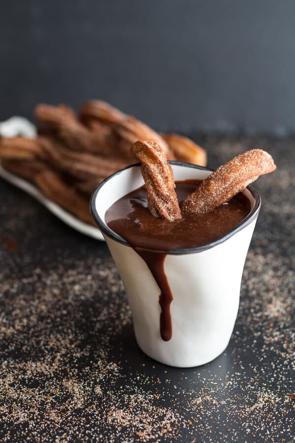 Mexican Beer Spiked Churros with Chocolate Dulce De Leche | halfbakedharvest.com