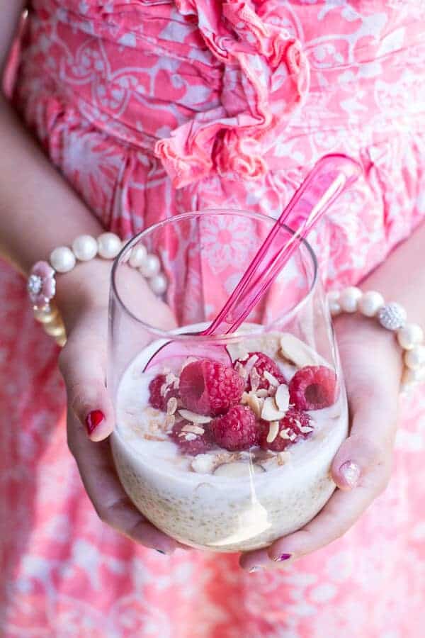 Vanilla Bean Coconut Quinoa Pudding with Honey Drizzled Raspberries | halfbakedharvest.com