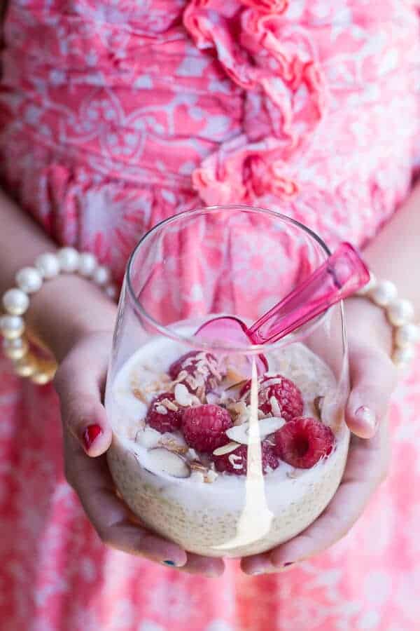 Vanilla Bean Coconut Quinoa Pudding with Honey Drizzled Raspberries | halfbakedharvest.com