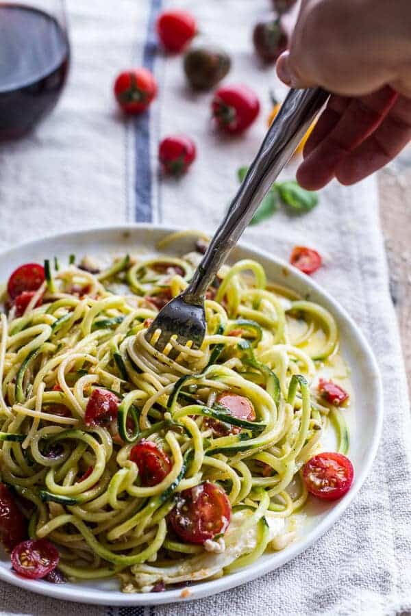 15-Minute Zucchini Pasta w- Poached eggs and Quick Heirloom Cherry Tomato Basil Sauce | halfbakedharvest.com