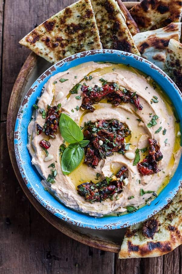 Cheesy Margarita Pizza Hummus with Grilled Pesto Pizza Bread | halfbakedharvest.com