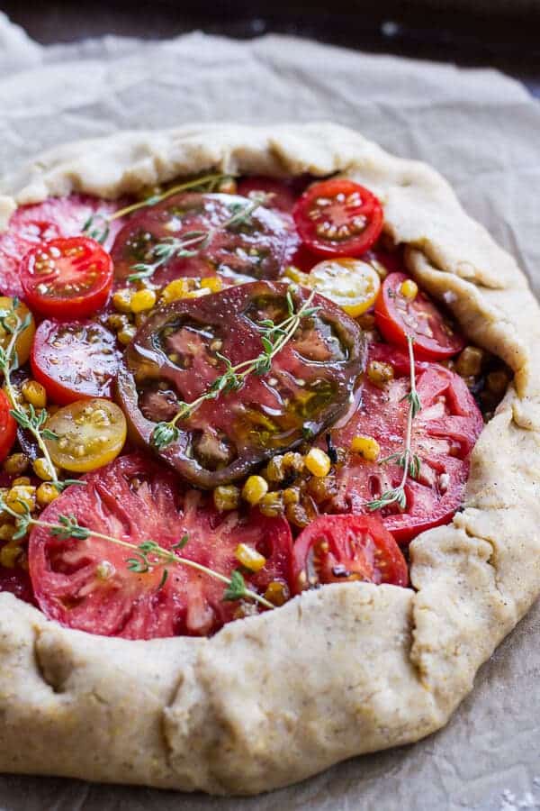 Caramelized Corn and Heirloom Tomato Galette w-Herbed Roasted Garlic Goat Cheese | halfbakedharvest.com @hbharvest