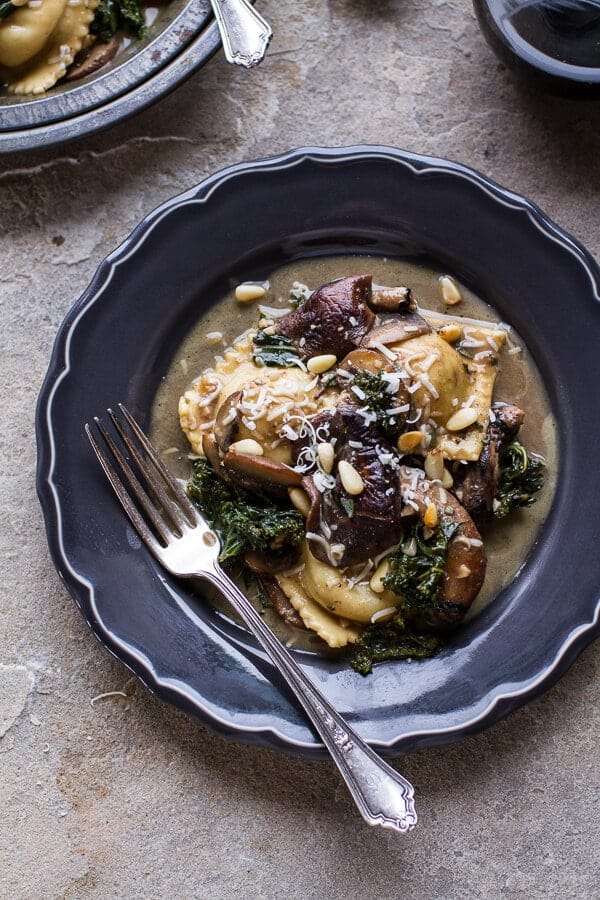 Taleggio Ravioli with Garlicy Butter Kale and Mushroom Sauce + Toasted Pine Nuts | halfbakedharvest.com @hbharvest