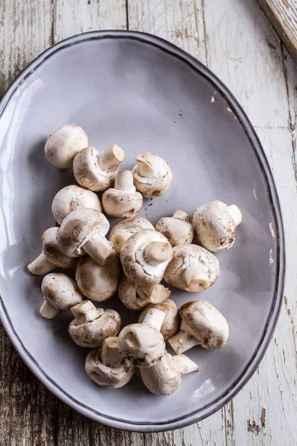 Spicy Fontina Spinach, Artichoke and Chorizo Stuffed Mushrooms | halfbakedharvest.com @hbharvest