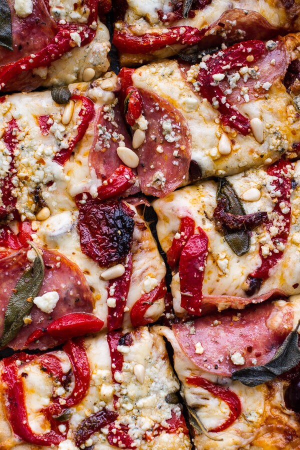 Sun-Dried Tomato and Olive Pesto Pizza with Salami + Roasted Red Peppers | halfbakedharvest.com @hbharvest