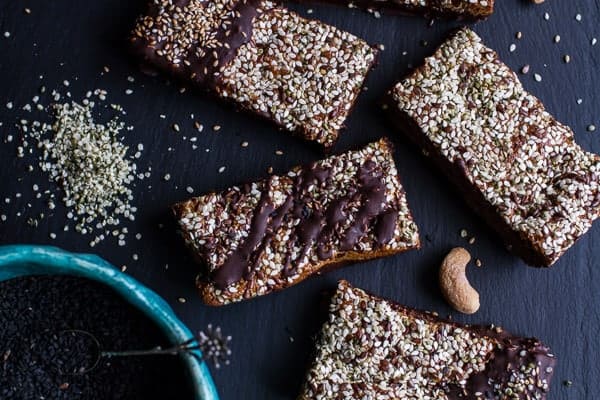Dark Chocolate Dipped Crunchy Coconut Cashew Sesame Bars | halfbakedharvest.com @hbharvest