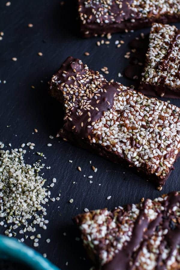 Dark Chocolate Dipped Crunchy Coconut Cashew Sesame Bars | halfbakedharvest.com @hbharvest