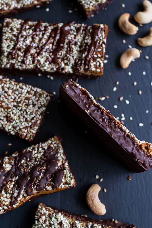 Dark Chocolate Dipped Crunchy Coconut Cashew Sesame Bars | halfbakedharvest.com @hbharvest