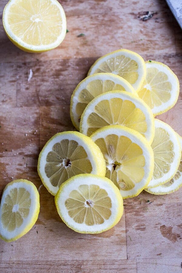 Garlic Butter Roasted Chicken Thighs with Charred Lemon Salsa Verde + Asparagus | halfbakedharvest.com @hbharvest