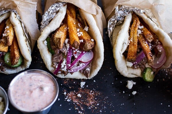 Greek Style Roasted Lamb Gyros with Harissa Spiced Tzatziki | halfbakedharvest.com @hbharvest