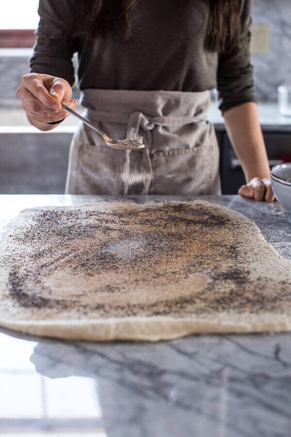 Meyer Lemon Poppy Seed Morning Buns with Blueberry Passionfruit Glaze | halfbakedharvest.com @hbharvest