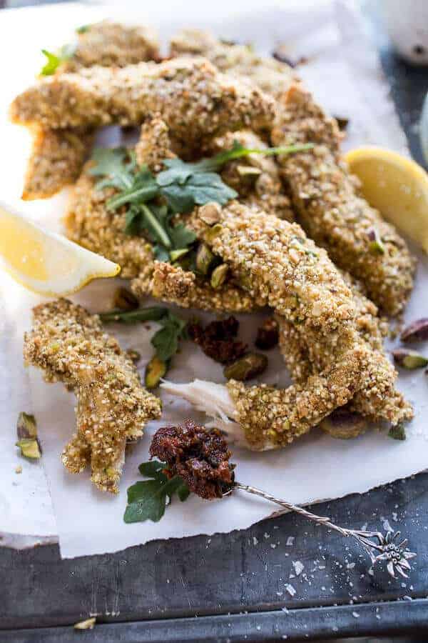 Pistachio Quinoa Dukkah Crusted Chicken Fingers with Sun-dried Tomato Pesto | halfbakedharvest.com @hbharvest