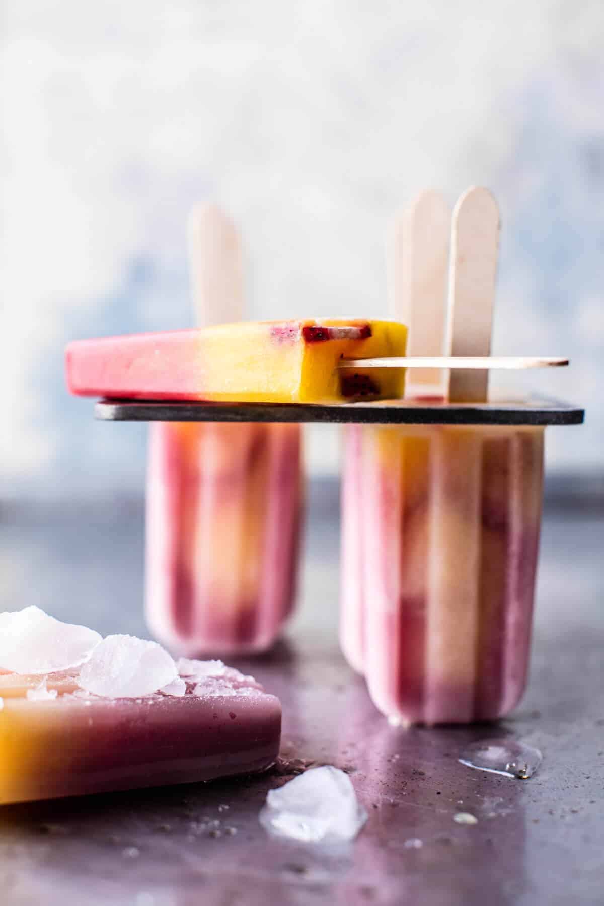 Three Ingredient Strawberry Mango Popsicles | halfbakedharvest.com @hbharvest
