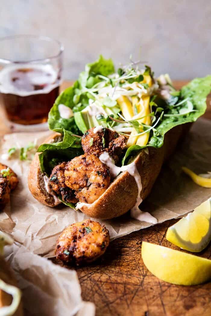 Lighter Shrimp Po Boys with Avocado Mango Slaw | halfbakedharvest.com @hbharvest