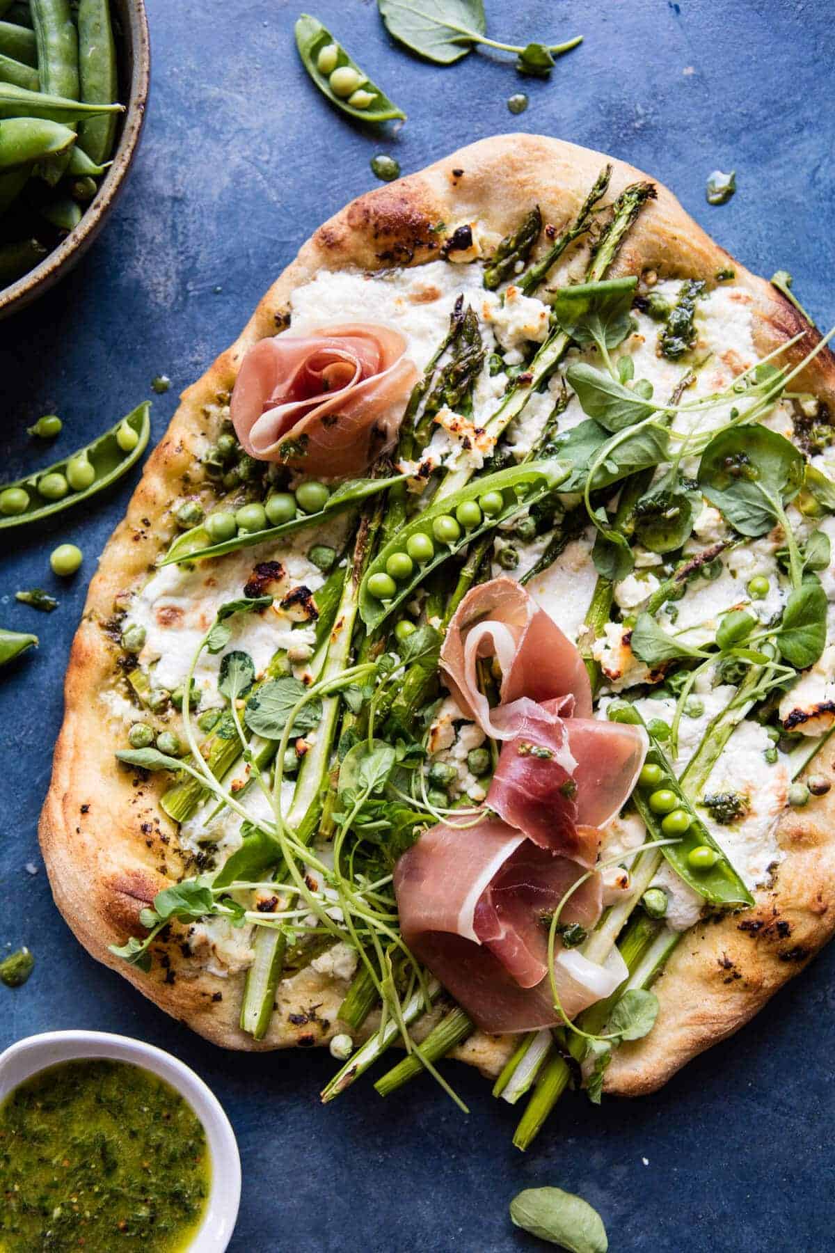Super Green Pea and Asparagus Burrata Pizza | halfbakedharvest.com @hbharvest