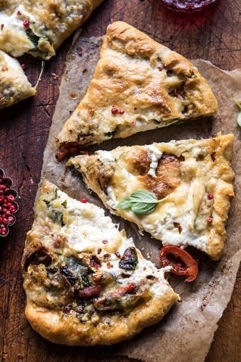 Spinach and Prosciutto Burrata Calzone | halfbakedharvest.com @hbharvest