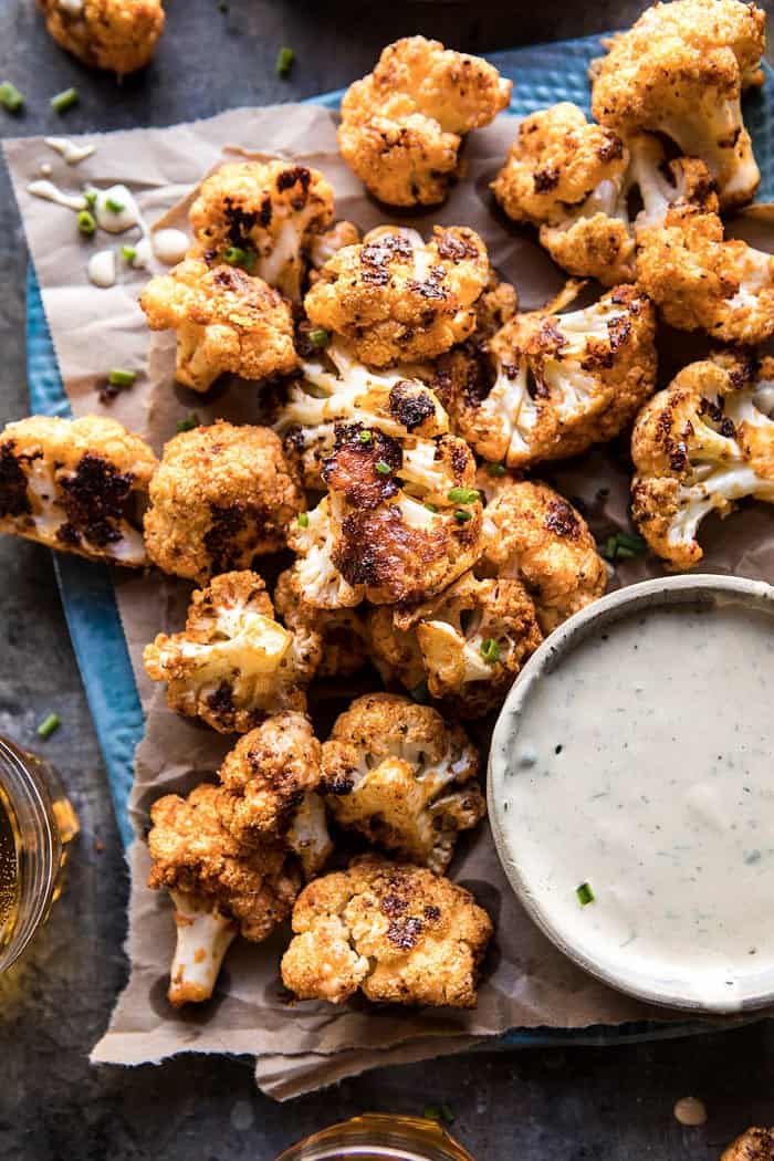 Spicy Cauliflower Cheese Bites with Tahini Ranch | halfbakedharvest.com #cauliflower #healthy #recipe