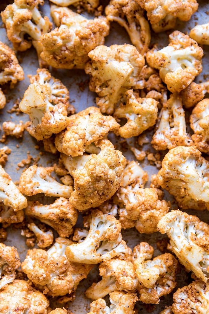 Spicy Cauliflower Cheese Bites with Tahini Ranch | halfbakedharvest.com #cauliflower #healthy #recipe