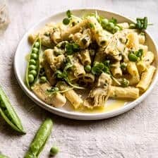 30 Minute Artichoke and Pea Rigatoni Pasta | halfbakedharvest.com #pasta #spring #artichokes #recipes