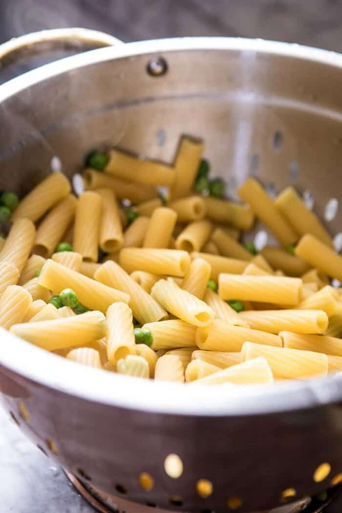 30 Minute Artichoke and Pea Rigatoni Pasta | halfbakedharvest.com #pasta #spring #artichokes #recipes