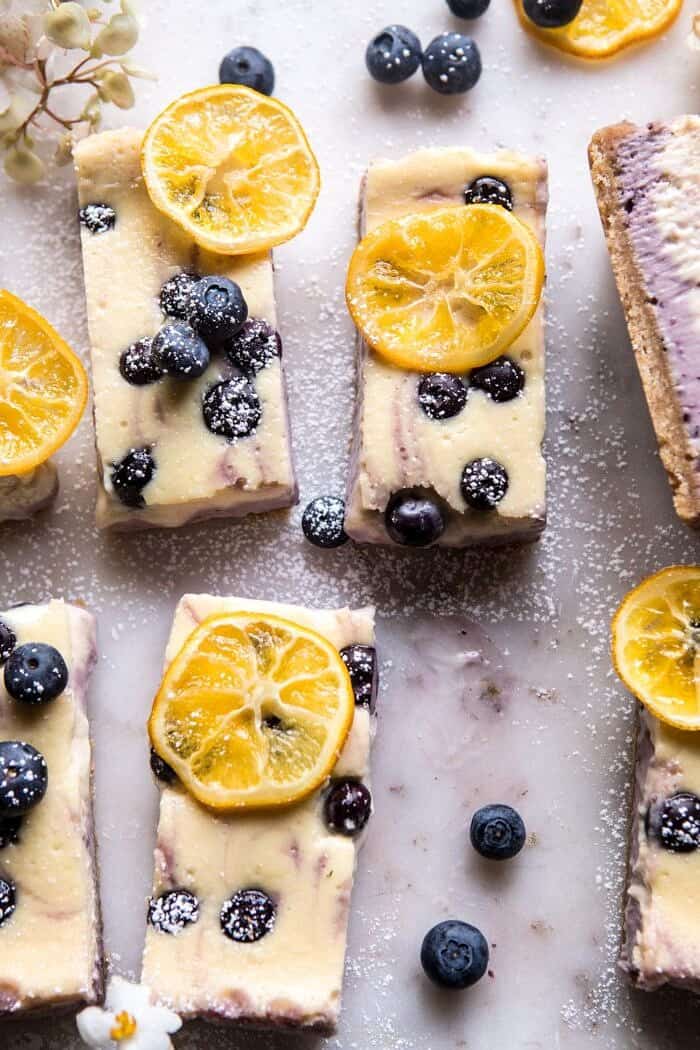 Blueberry Lemon Cheesecake Bars with Candied Lemon | halfbakedharvest.com #spring #easter #cheesecake #dessert