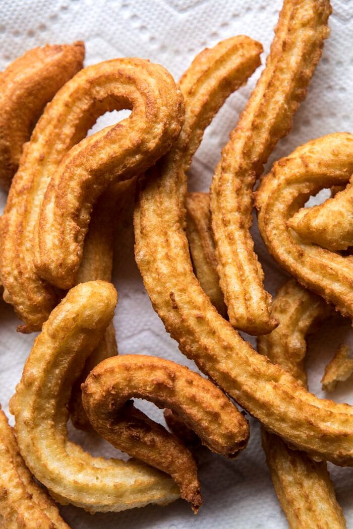 Easy Cinnamon Churros with Coffee Chocolate Sauce | halfbakedharvest.com #mexican #doughnut #dessert #chocolate
