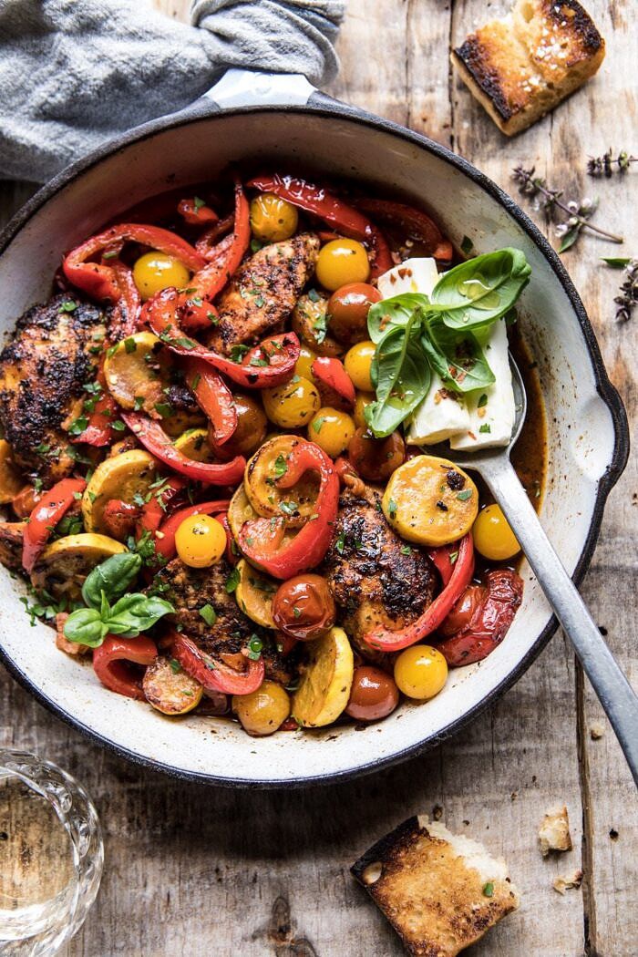 overhead side angle photo of Skillet Lemon Pepper Chicken and Garden Veggies with Feta and Basil 