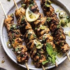 Moroccan Grilled Chicken with Herby Lemon Olive Vinaigrette | halfbakedharvest.com #chicken #summerrecipes #grilledchicken #easyrecipes