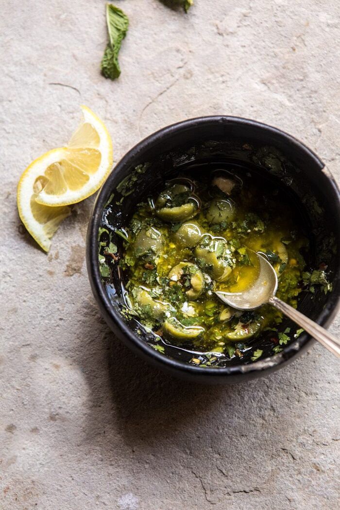 overhead photo of Herby Lemon Olive Vinaigrette