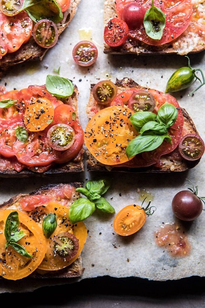 close up photo of Heirloom Tomato, Basil, and Manchego Toast
