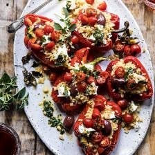 Greek Orzo Stuffed Red Peppers with Lemony Basil Tomatoes | halfbakedharvest.com #healthy #summerrecipes #easy #dinner #greek