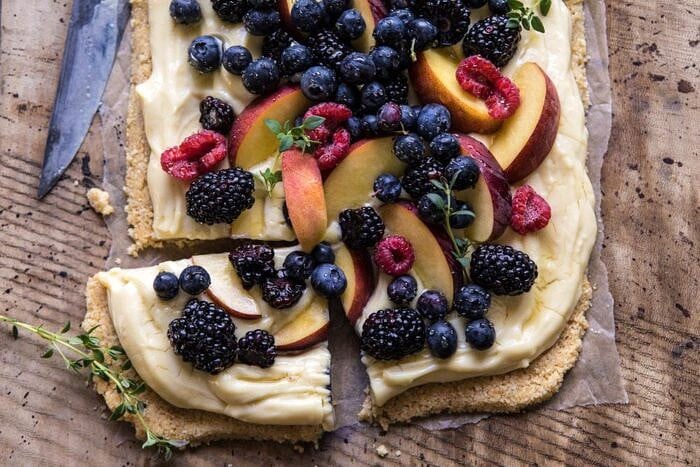 No Bake Mixed Berry Custard Tart | halfbakedharvest.com #summerrecipes #easyrecipes #nobake #fruit horizontal overhead photo of No Bake Mixed Berry Custard Tart