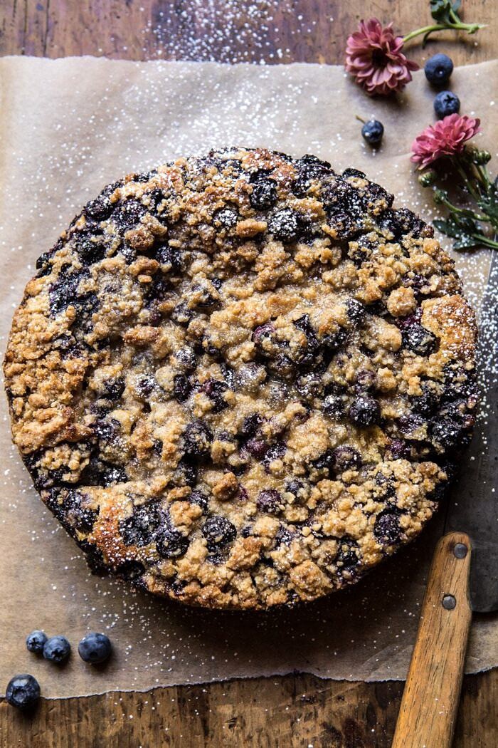 Bursting Blueberry Cardamom Buckle | halfbakedharvest.com #blueberry #cake #summerrecipes #easyrecipes #dessert overhead photo of Bursting Blueberry Cardamom Buckle before being cut into