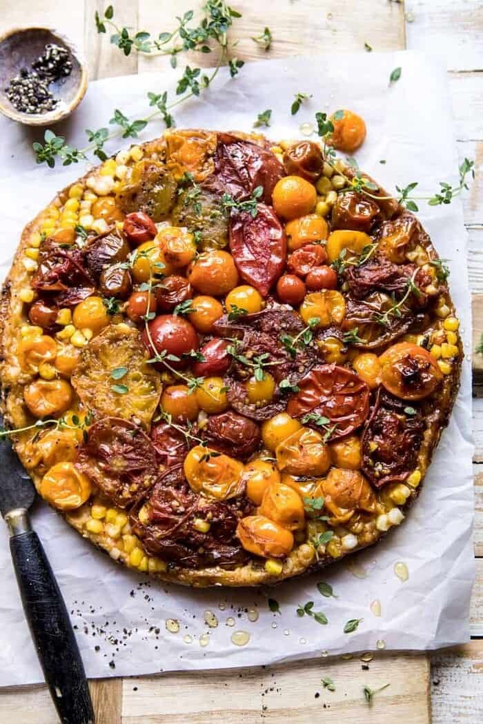 Caramelized Corn and Tomato Tarte Tatin | halfbakedharvest.com #simple #east #tomatoes #summer #tomatotart overhead photo of Caramelized Corn and Tomato Tarte Tatin