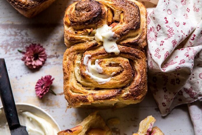 Flaky Pull Apart Cinnamon Peach Brioche Bread | halfbakedharvest.com #bread #brunch #breakfast #peaches #summer #baking horizontal overhead photo of Flaky Pull Apart Cinnamon Peach Brioche Bread