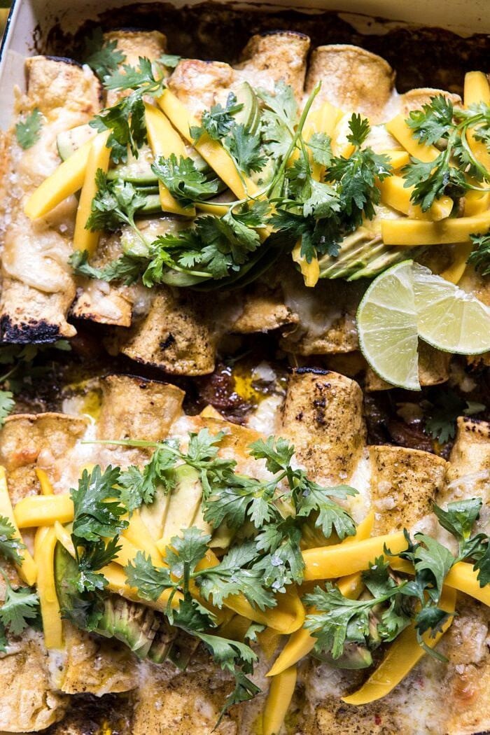 overhead close up photo of Salsa Verde Chicken and Zucchini Enchiladas with Mango 