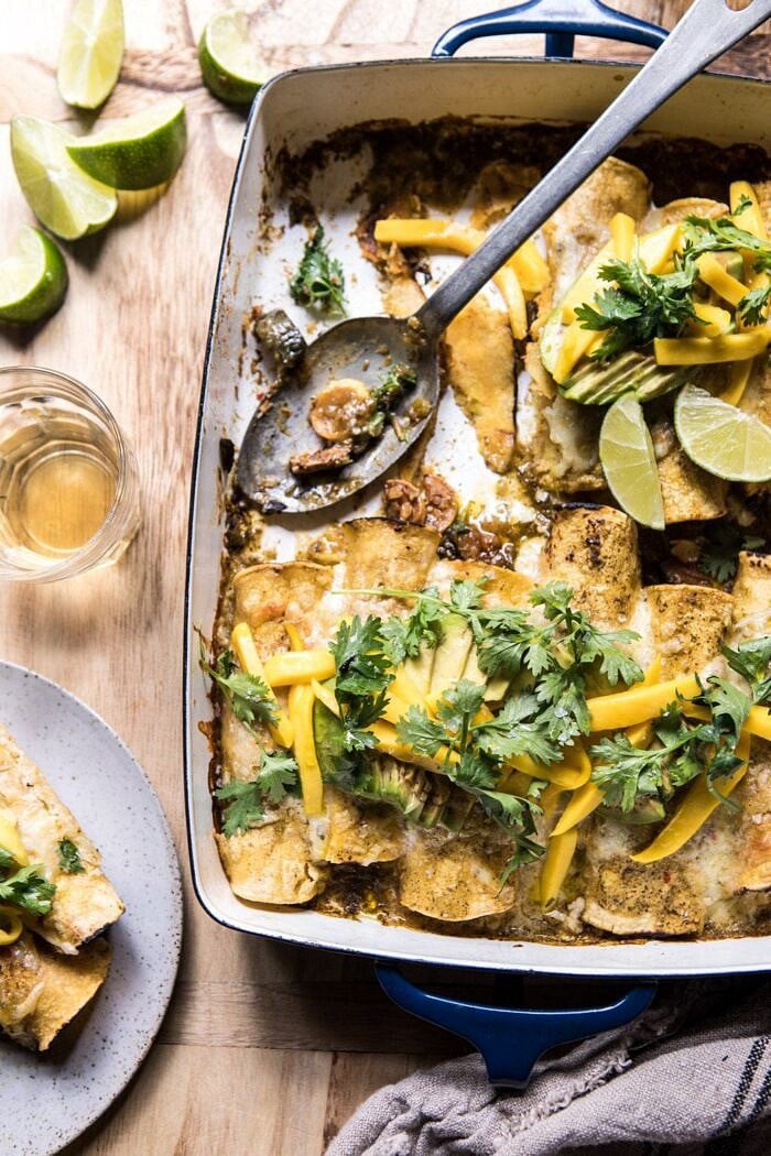 Salsa Verde Chicken and Zucchini Enchiladas with Mango with enchiladas on a plate 