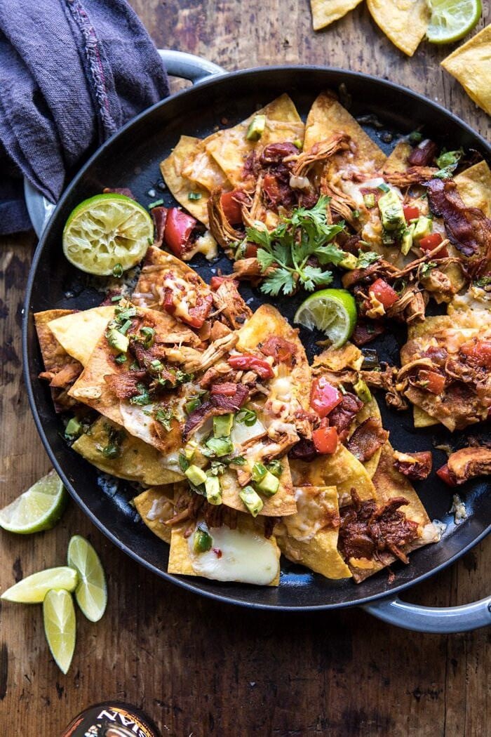 Chipotle Braised Chicken Nachos half eaten on plate 