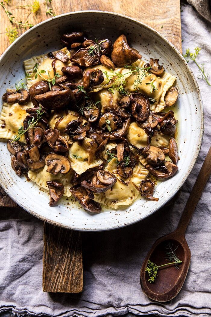 Herby Buttered Balsamic Mushroom Ravioli | halfbakedharvest.com #mushrooms #italian #ravioli #easyrecipes Herby Buttered Balsamic Mushroom Ravioli in serving bowl