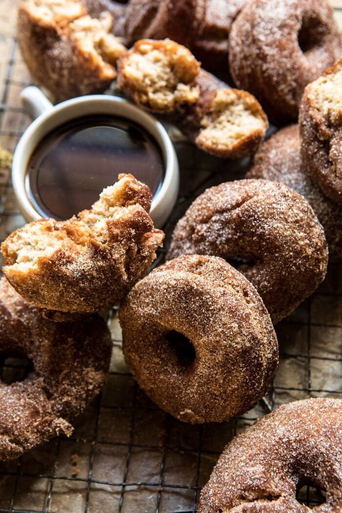 Mulled Spiced Apple Cider Doughnuts | halfbakedharvest.com #applecider #cinnamonsugar #doughnuts #applebutter #maple #fall #autumn #harvest close up side angle photo of Mulled Spiced Apple Cider Doughnuts