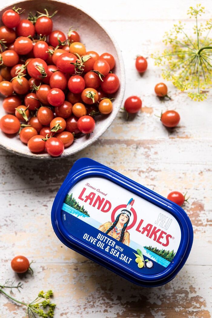 Prosciutto Chicken Parmesan with Garlic Butter Tomato Pasta | halfbakedharvest.com #pasta #easyrecipe #tomatoes #familyrecipes overhead photo of land o'lakes butter